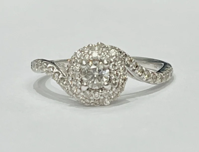 ladies engagement rings prong-This gorgeous engagement ring features a 1/2ctw in natural d...