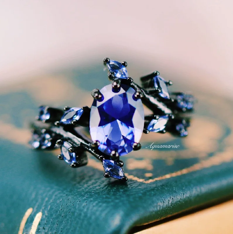 ladies engagement rings new-Cornflower Blue Sapphire Leaf Engagement Ring- Black Rhodium Filled