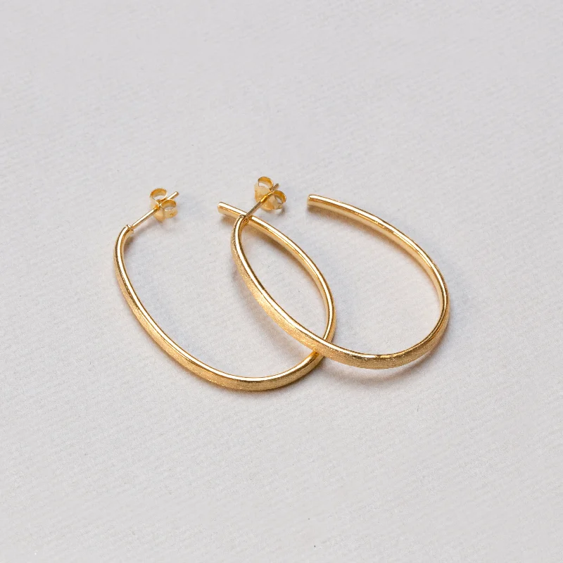 ladies earrings cross-Textured Gold Oval Stud Hoop Earrings