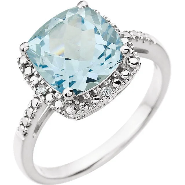 Ladies rings renaissance glow -14KT WHITE GOLD SKY BLUE TOPAZ AND DIAMOND RING