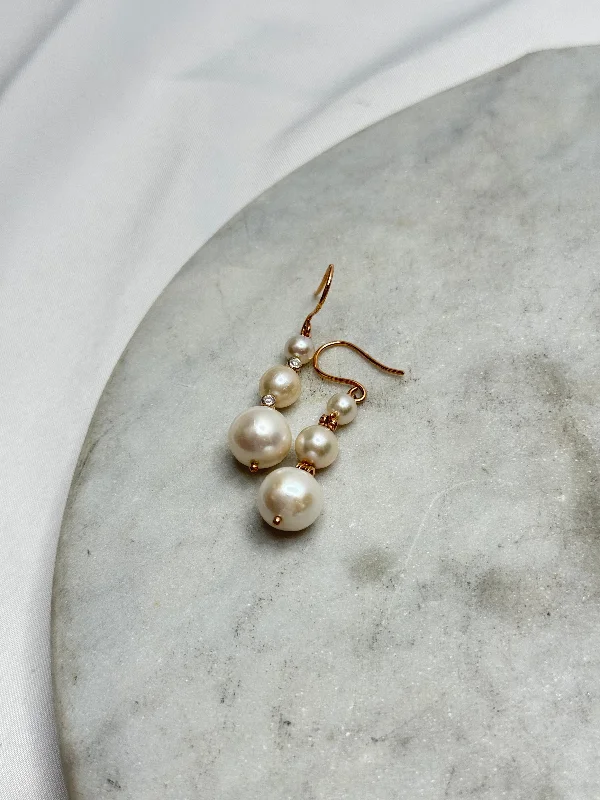 ladies earrings spiritual-Earrings - Graduated Pearl Drops on Rose Gold w/ Diamonds