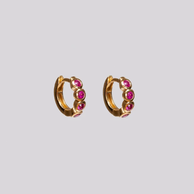 ladies earrings 1980s-Gold Huggie Earrings with Ruby Pink Stone