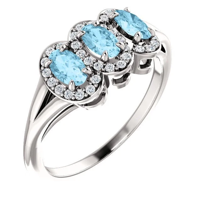 Ladies rings split shine -14KT GOLD .60 CTW AQUAMARINE & .16 CTW DIAMOND 3 STONE HALO RING